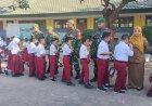 Tumbuhkan Nasionalisme Lewat Upacara, Satgas TMMD ke-126 Kodim 0815/ Mojokerto Jadi Inspirasi Anak Sekolah
